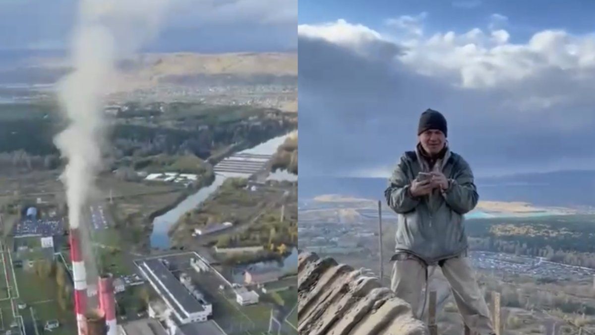 Russische klimmers nemen een kijkje bovenop een mega hoge schoorsteen