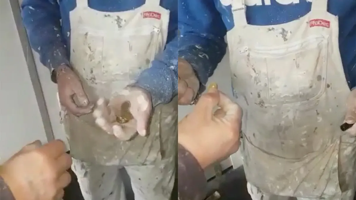 Bouwvakkers nemen collega te grazen door te toveren met een muntje