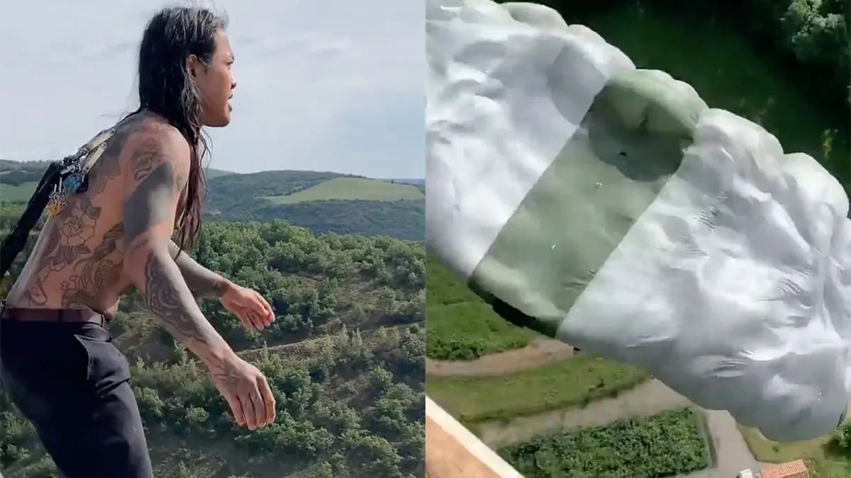 Man maakt basejump met haken vast in de huid van zijn rug