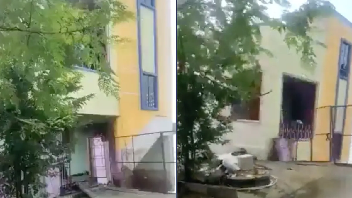 Overstroomde rivier neemt huis in India mee