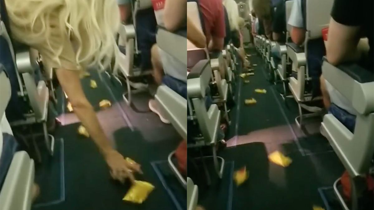 Nootjes glijden over het gangpad in vliegtuig