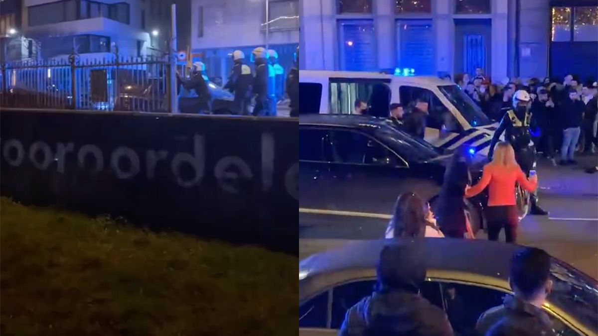 Jaarwisseling Antwerpen was ook gezellig: Politie helpt feestvierder even oversteken