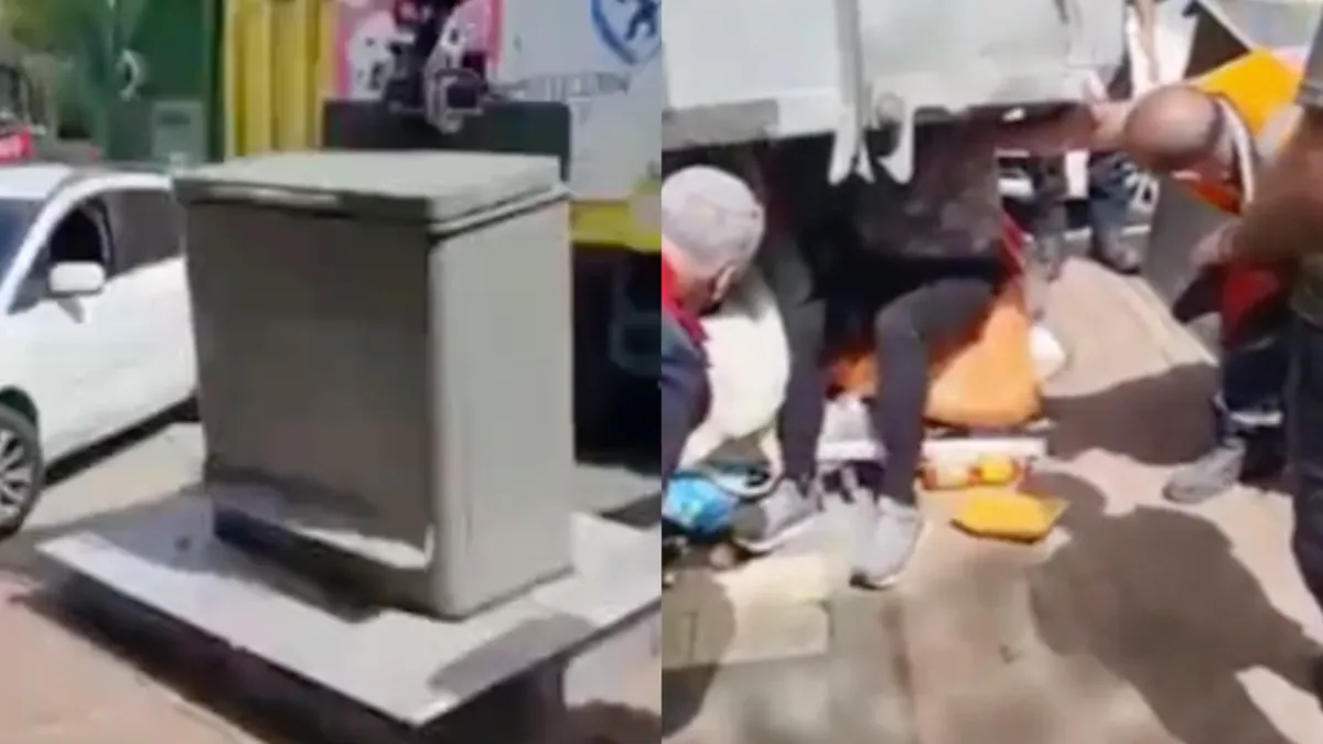 Oude baas kwam op de een of andere wijze in een ondergrondse vuilcontainer terecht