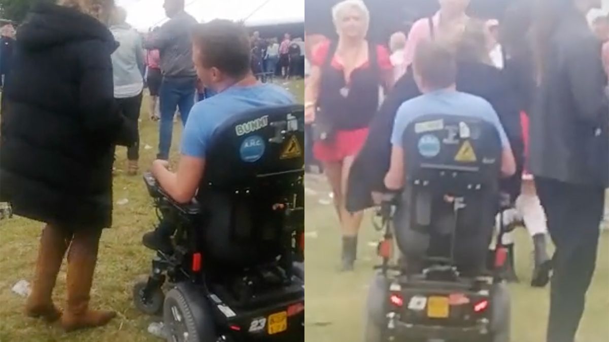 Man in rolstoel geeft dame een lift en rost andere festivalbezoekers omver