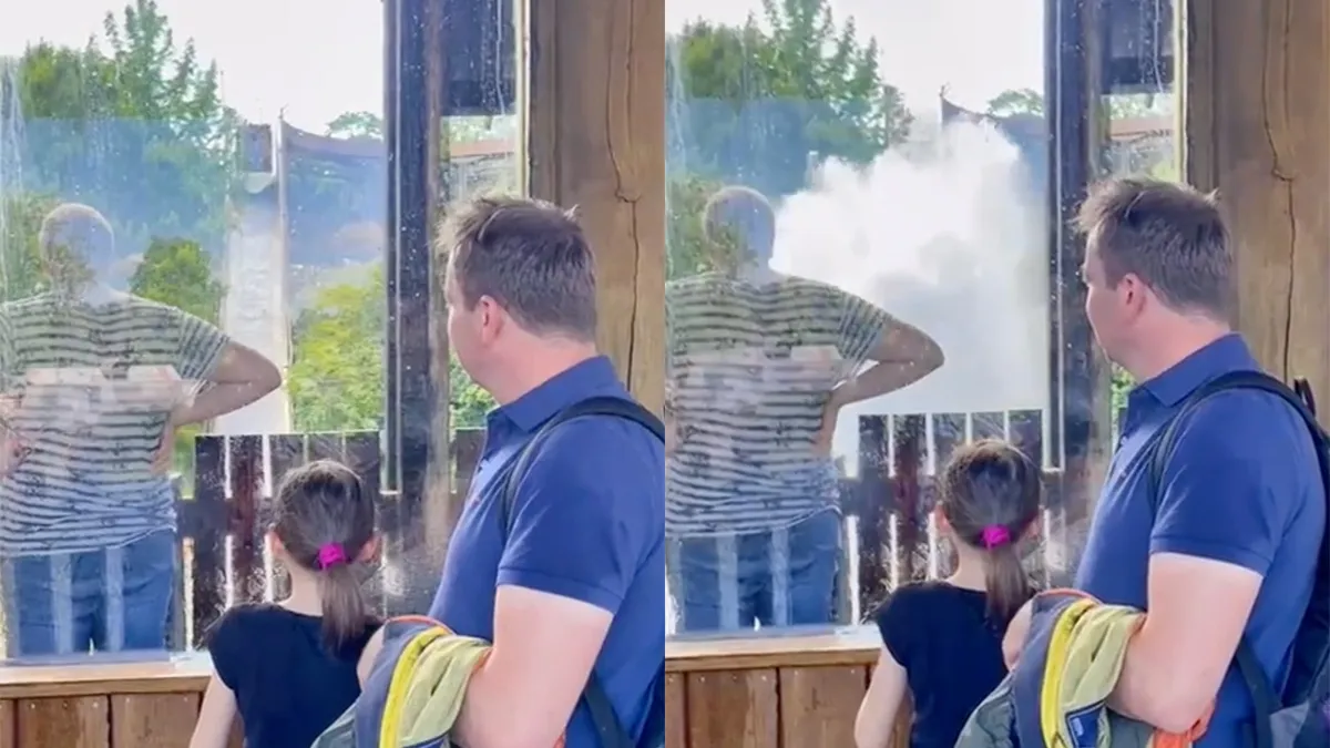 Iemand in pretpark weet duidelijk niet dat je nat wordt op uitkijkpunt