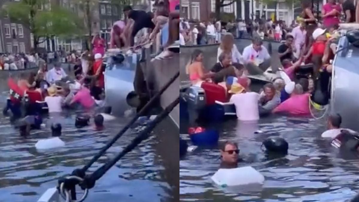 Ondertussen tijdens Canal Parade: Bootje blijft niet varen en mensen moeten zwemmen