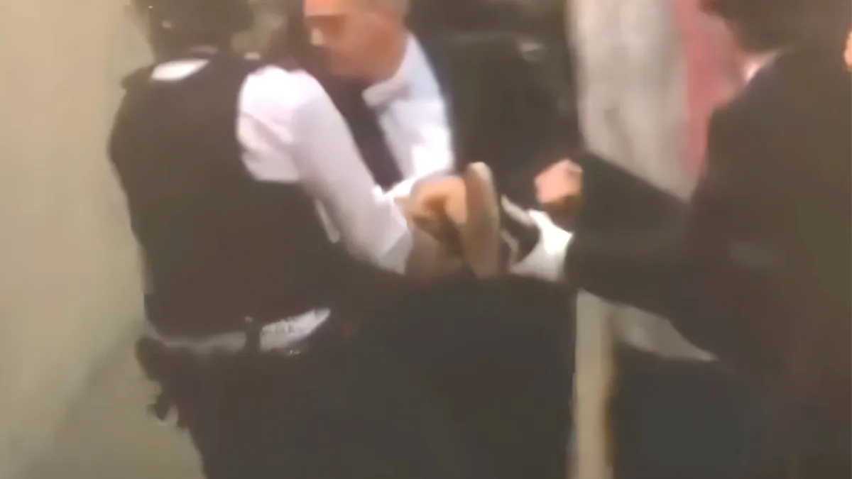 Man tegen de grond gewerkt nadat hij kist Queen Elizabeth aan wilde raken