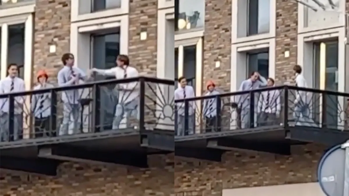 Vindicat-leden gaan gezellig op de vuist op balkon aan de Grote Markt in Groningen