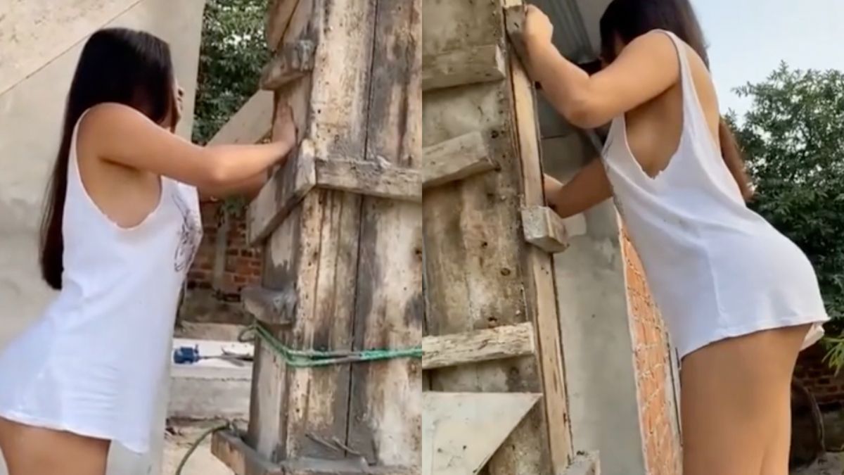 Dame helpt een handje mee bij het verwijderen van de betonbekisting