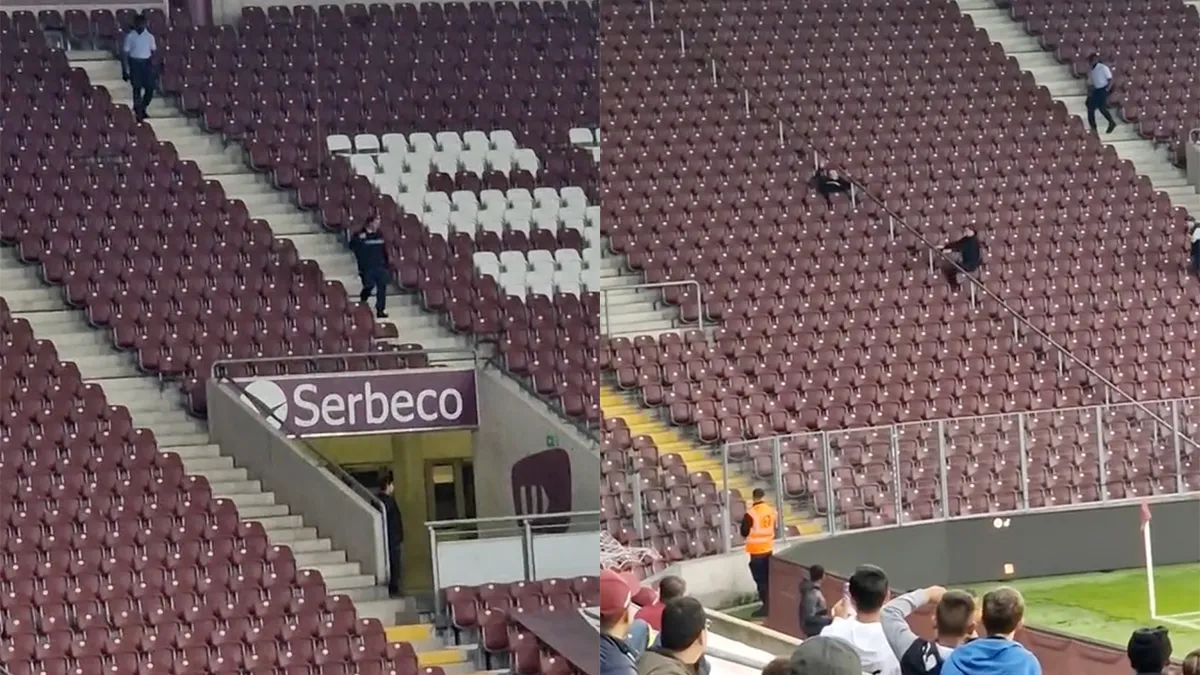 Man speelt spelletje Pac-Man met stewards op tribune