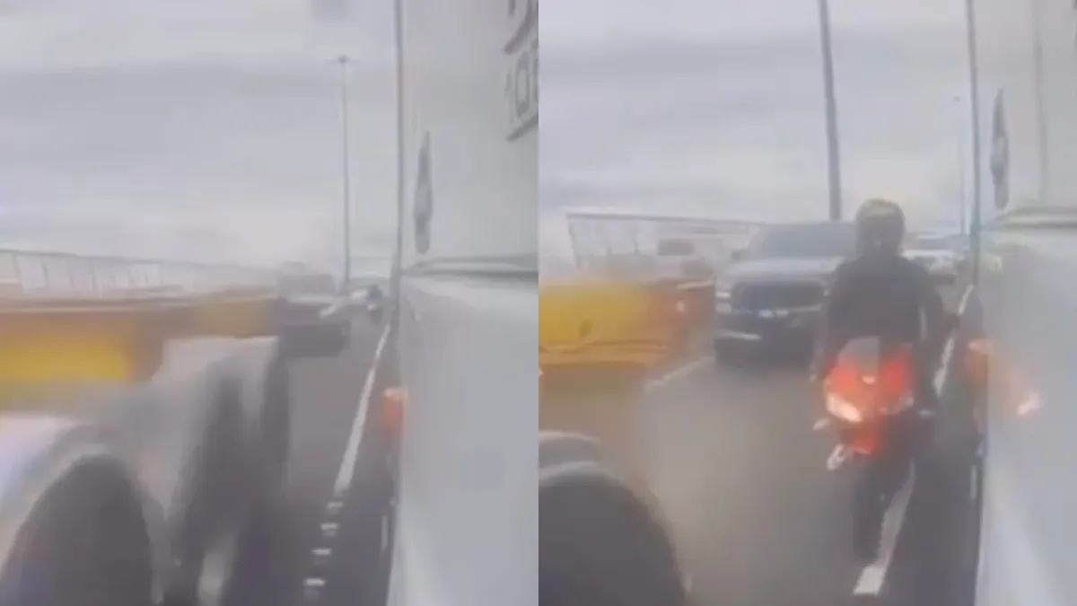 Motorrijder denkt wel tussen twee vrachtwagens te kunnen rijden