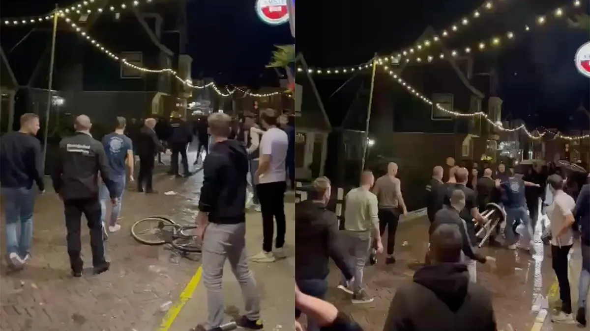 Gezelligheid door rellende supporters na de wedstrijd FC Volendam tegen FC Utrecht