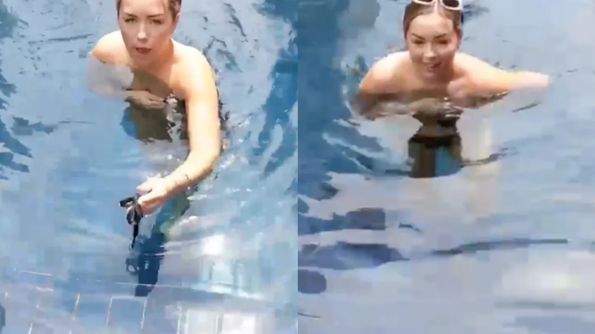 Lucy haar bikini lost op tijdens het zwemmen