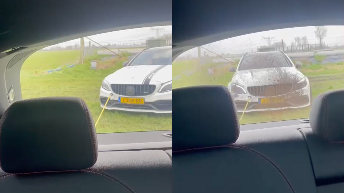 GLC43 AMG trekt C63 AMG uit een weiland