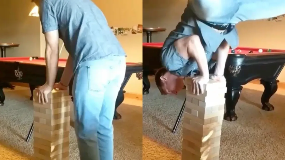 Joh, dus een Jenga toren is niet de meest ideale plek voor een handstand…