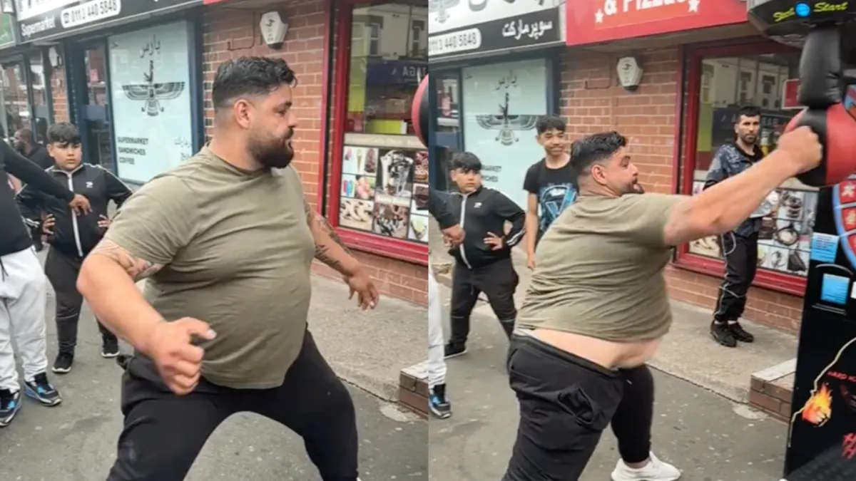 Knakker gooit een beetje massa achter beuk tegen de boksbal