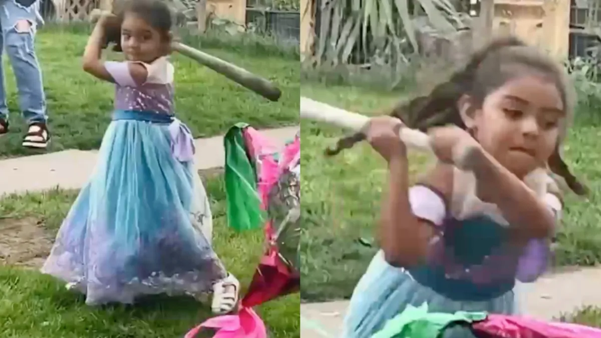 Kleine prinses gaat beast mode op een piñata