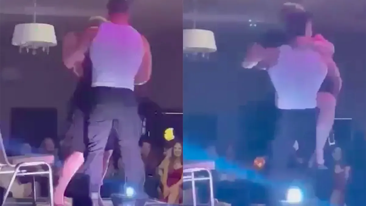 Vrouw is wel heel opgewonden als ze door stripper op podium wordt getild