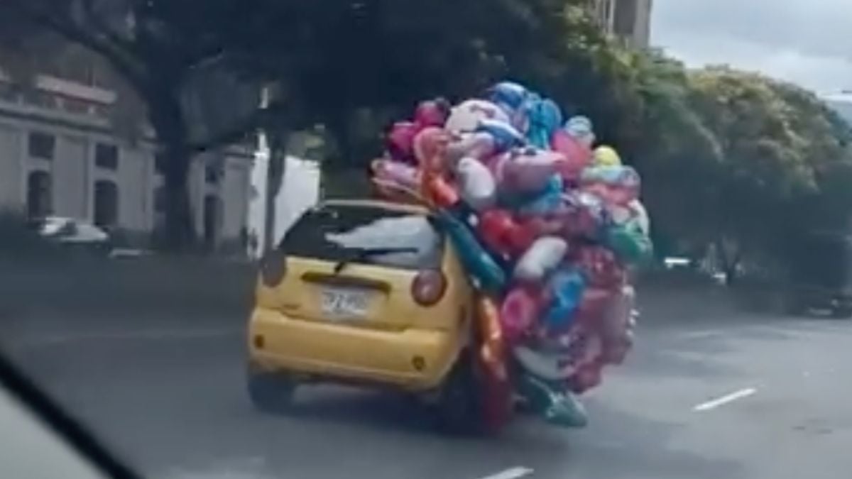 Ook de ballonnenverkoper moet naar zijn werk