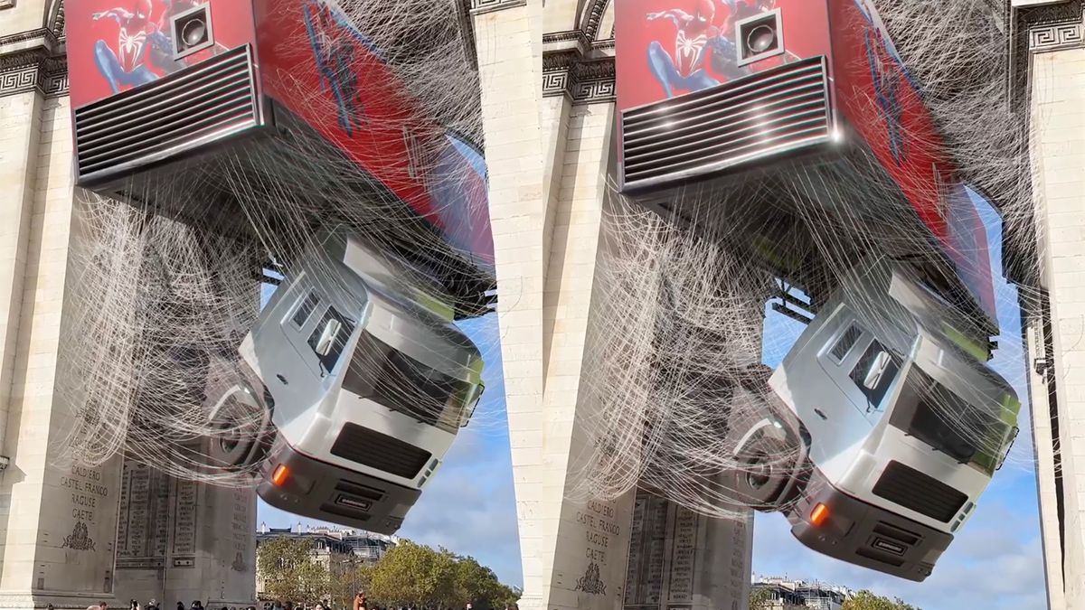 Ondertussen in Parijs: Spider Man heeft een vrachtwagen opgehangen onder Arc de Triomphe...