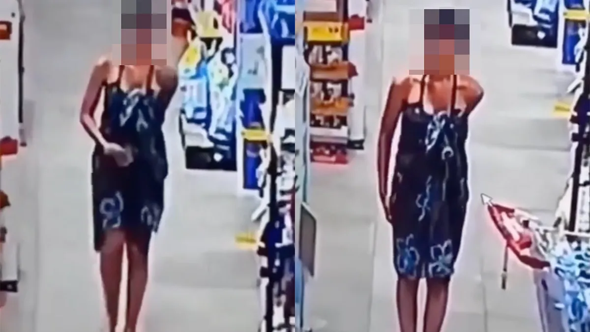 thumb vk vrouw heeft last van grote boodschap en probeert deze weg te moffelen in supermarkt