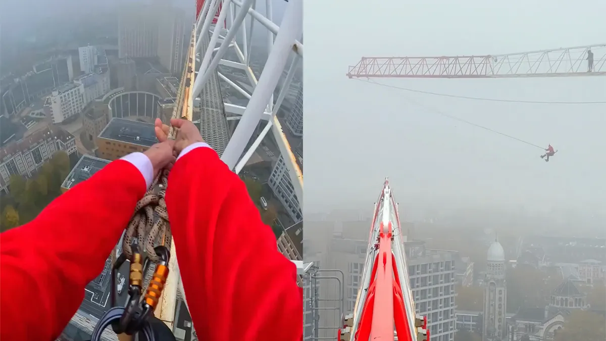 thumb vk kerstman in franse stad lille doet gevaarlijke stunt van een kraan