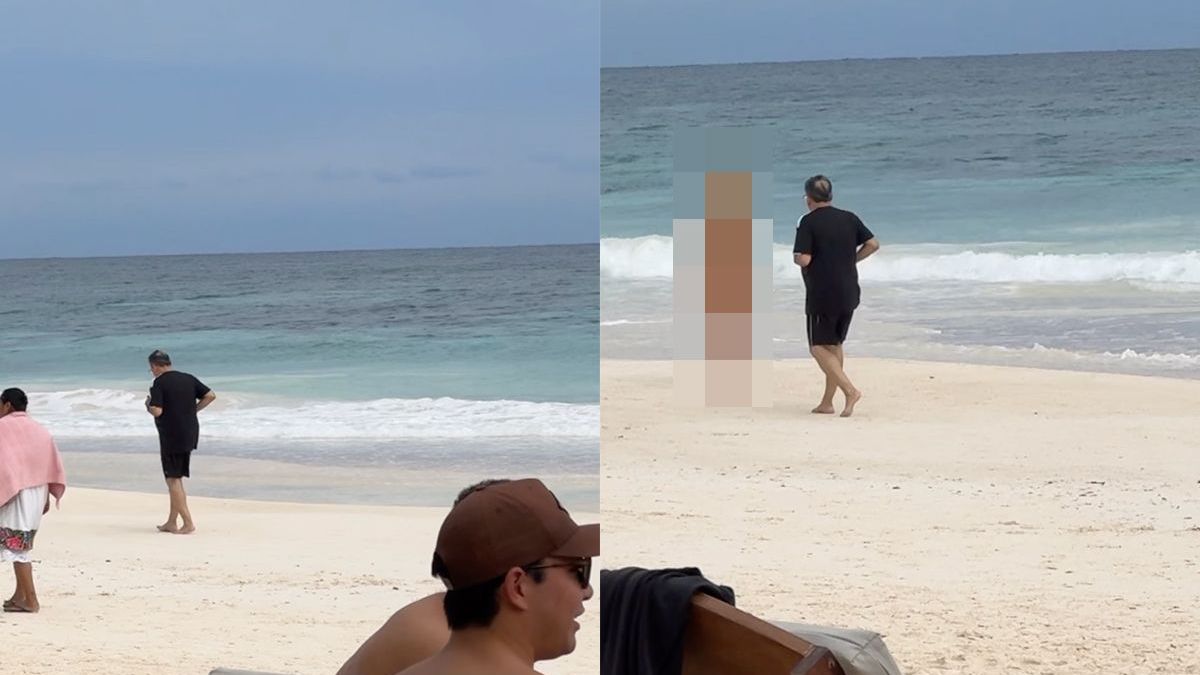 Man op strand van Tulum doet een beetje vreemd, maar opeens is alles duidelijk