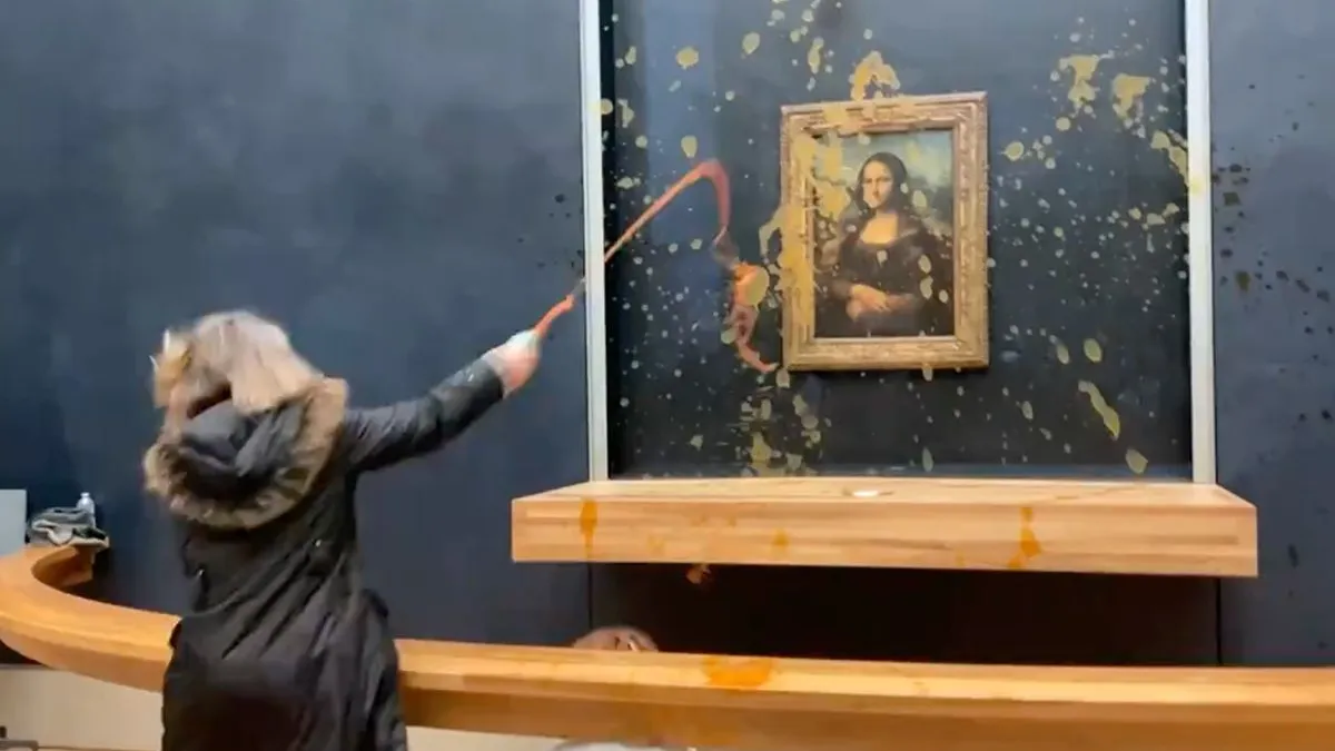 thumb vk milieuactivisten hebben geen honger meer en gooien soep tegen glas voor mona lisa