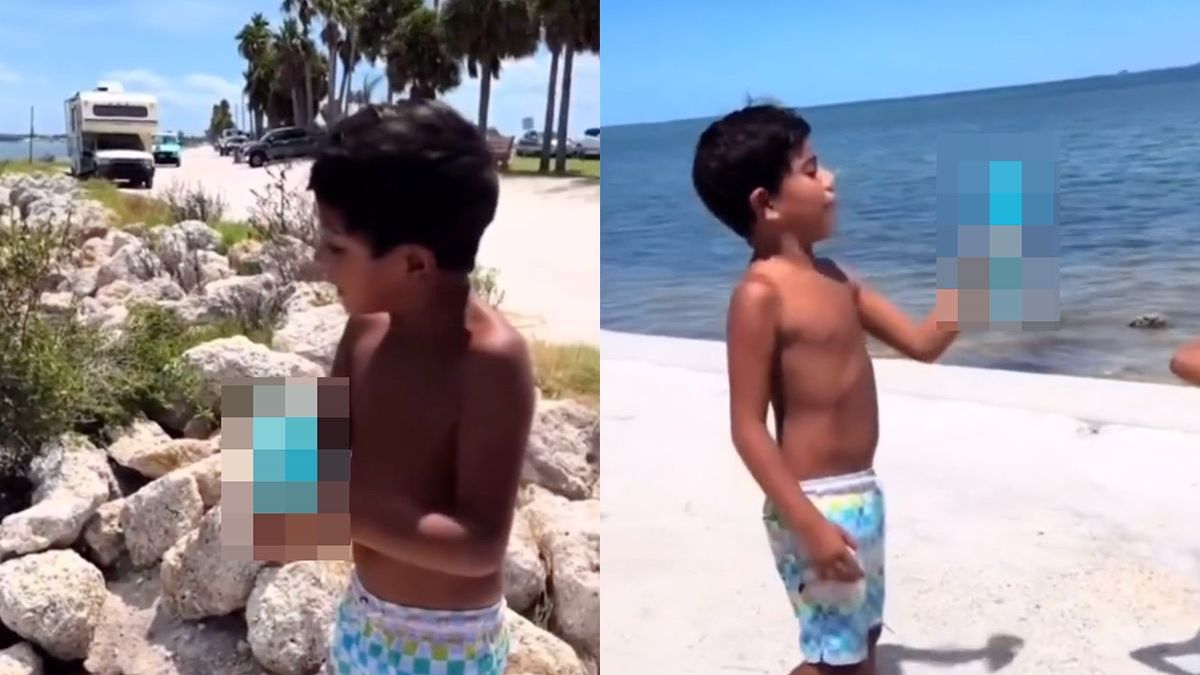 Jongen denkt harde blauwe kwal te hebben gevonden op het strand