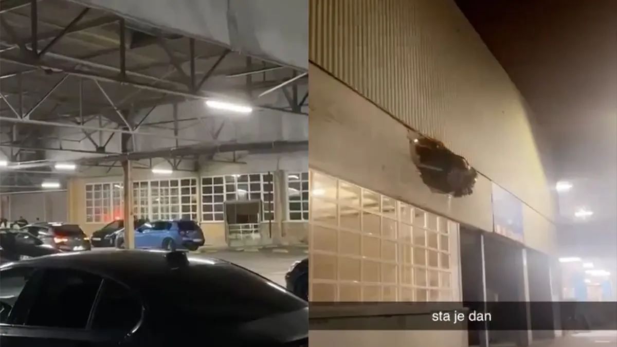thumb vk straatracer parkeert auto door muur van parkeergarage in antwerpen