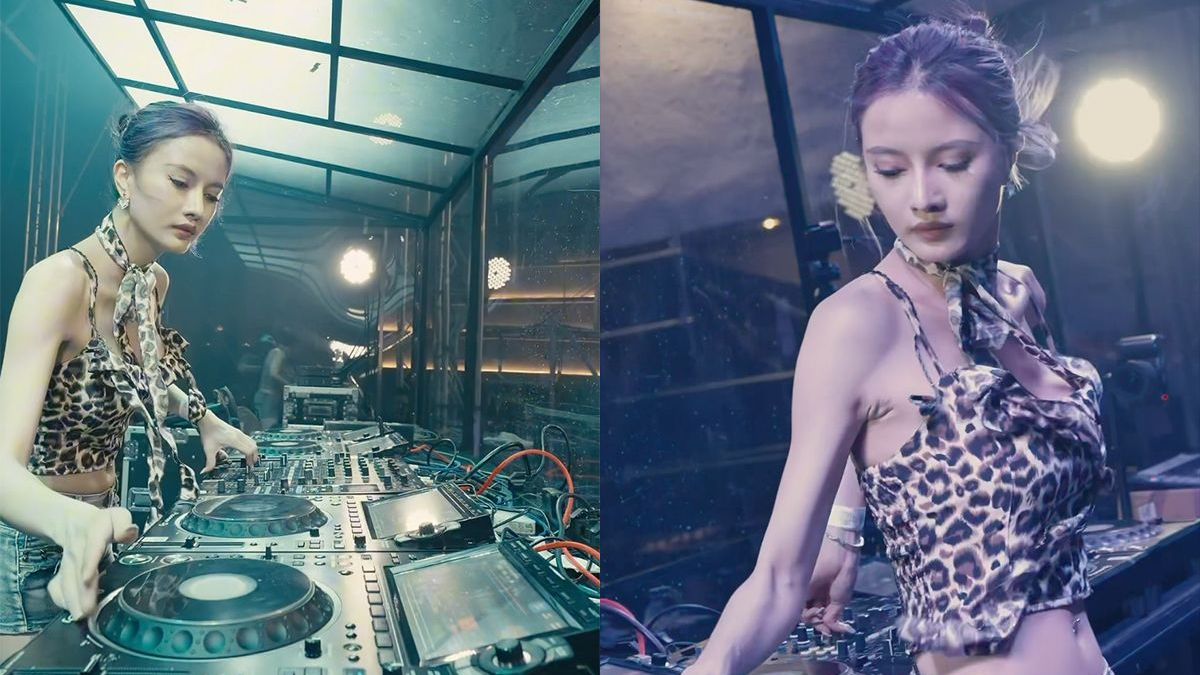 Vrouwelijke DJ laat zich niet van de wijs brengen als fotograaf per ongeluk knopje indrukt