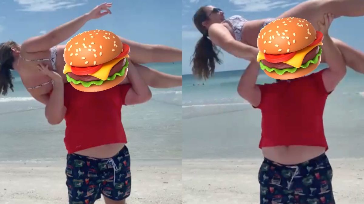 Vrouw de dupe als haar vent stoer probeert te doen op het strand