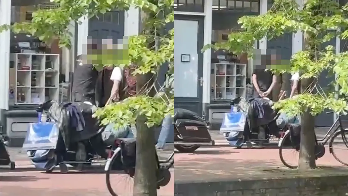 thumb vk life en personality coach gooit petje in het water van dakloze man in leeuwarden