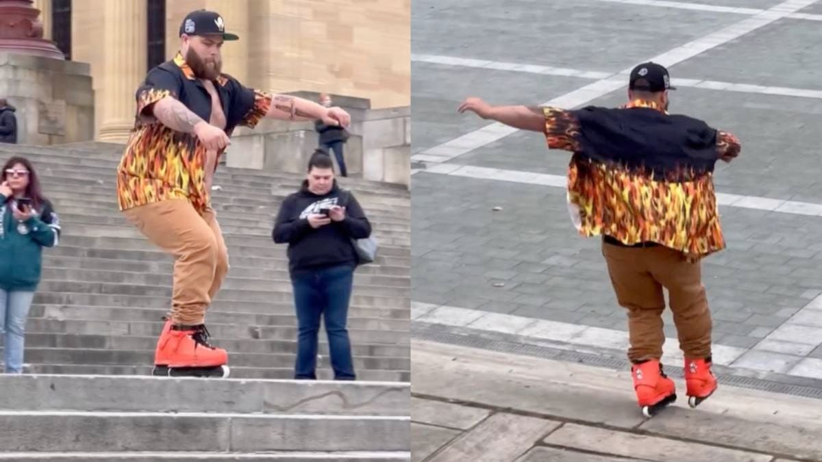 Open vlammen-overhemd, skeelers en dan de Rocky Steps af als een stuntman