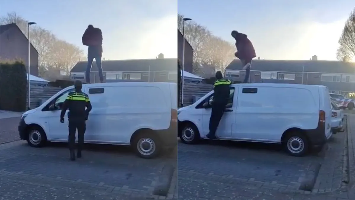 thumb vk man in vaassen staat te stampen op dak van busje en wil er niet af komen