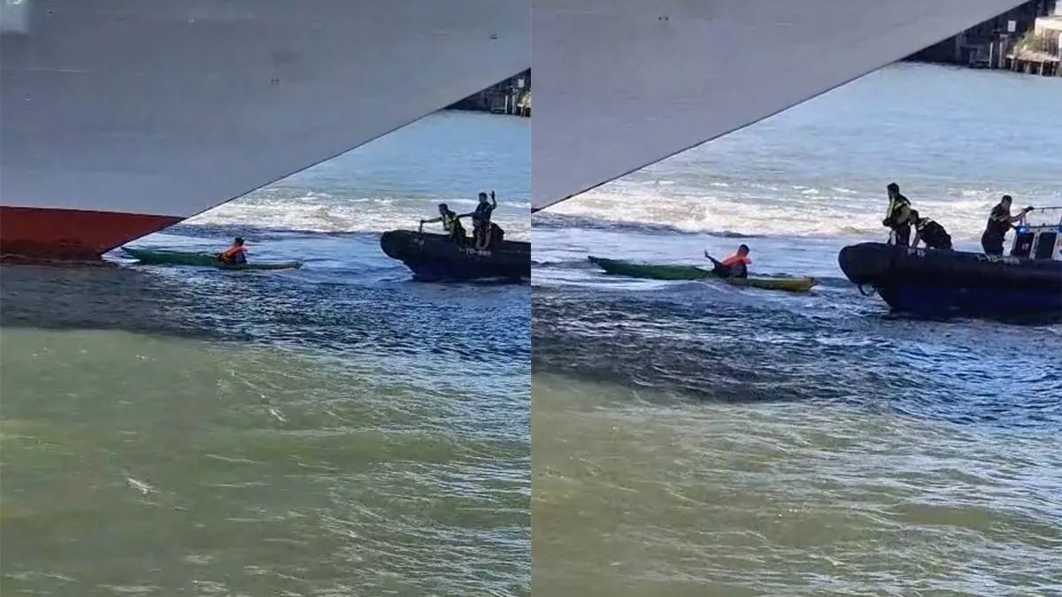 thumb_vk_Demonstrant_van_Extinction_Rebellion_probeert_in_kano_groot_cruiseschip_te_overvaren