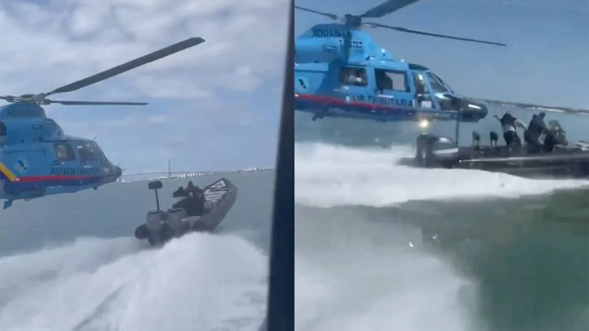 thumb_vk_Ondertussen_in_de_Baai_Golf_van_Cadiz_Helikopter_zit_achter_boot_vol_witte_sneeuw_aan