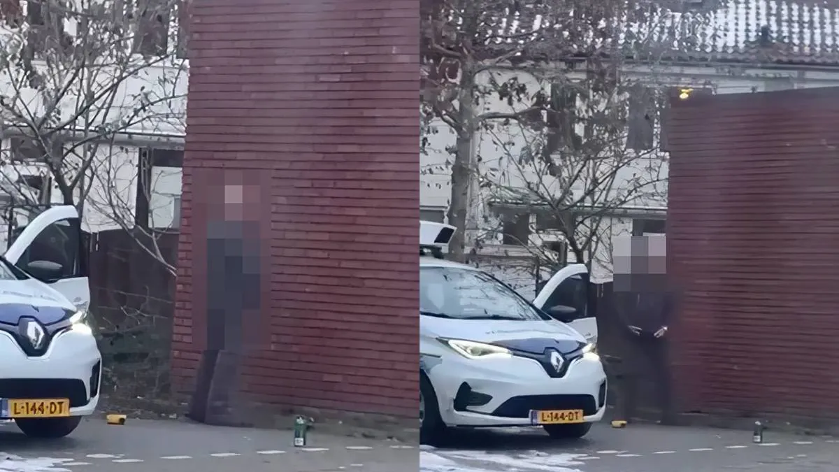 thumb_vk_Ondertussen_in_Dordrecht_parkeerboa_parkeert_auto_om_wild_te_plassen