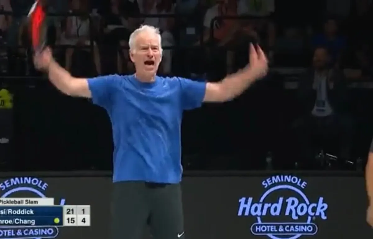 VIDEO McEnroe amped up after scoring point against Roddick and Agassi