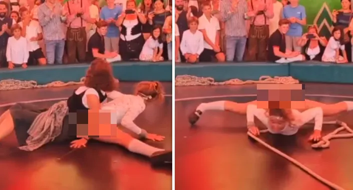 Dame heeft goede tactiek om een ritje op het 'Duivelsrad' op het Oktoberfest te overleven