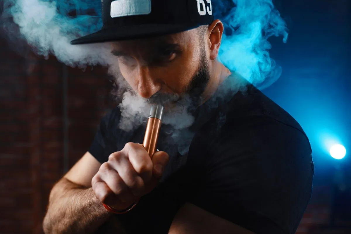 man vaping electronic cigarette 158595 3039