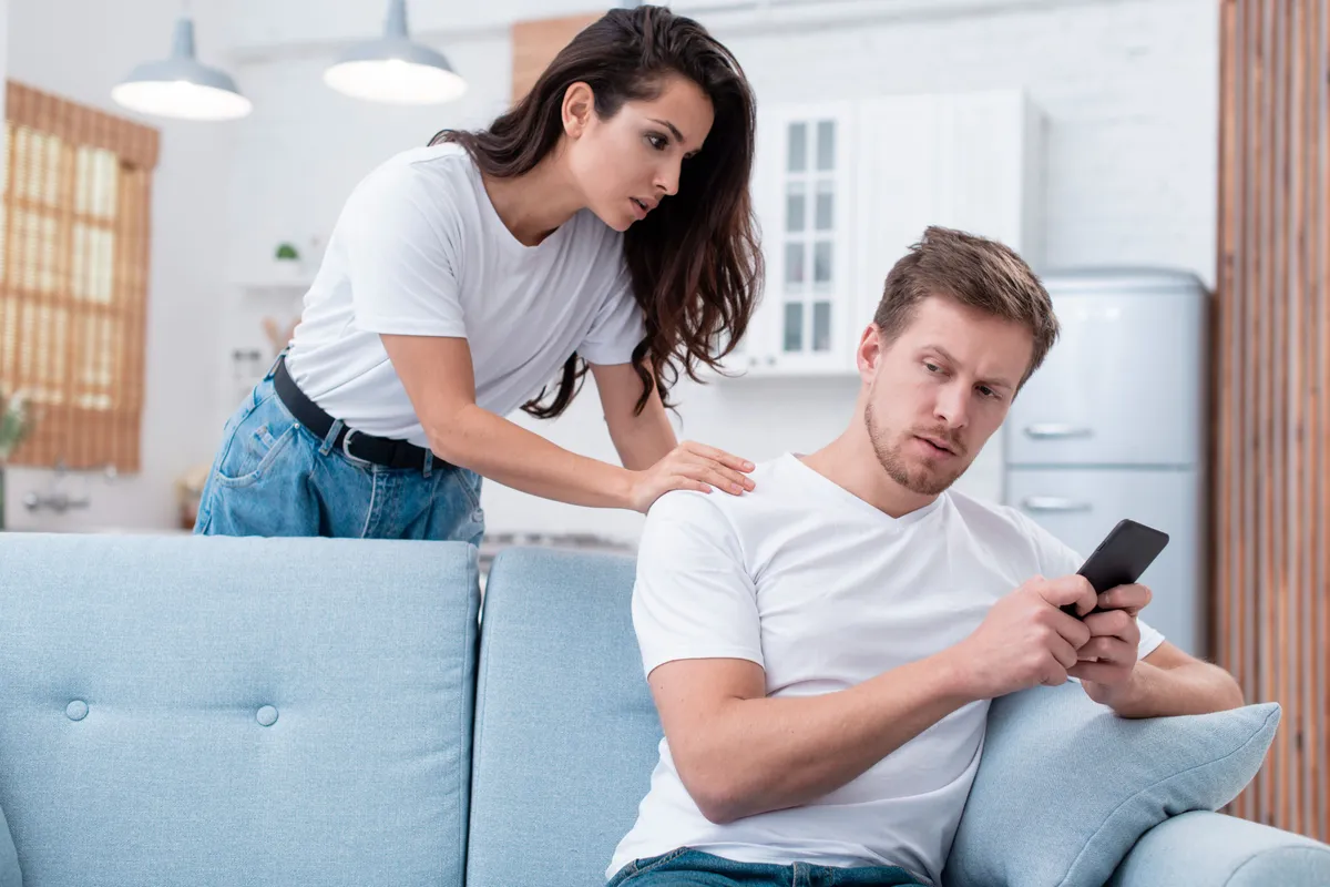woman arguing with her internet addicted boyfriend