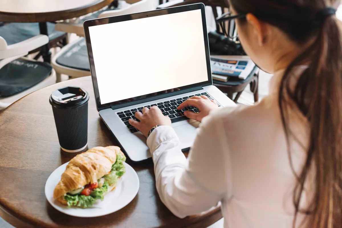 businesswoman with laptop coffee shop