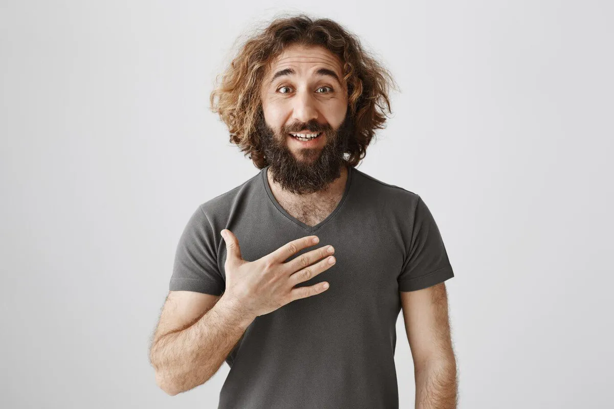 honest middle eastern man pointing himself as being sincere 176420 20526