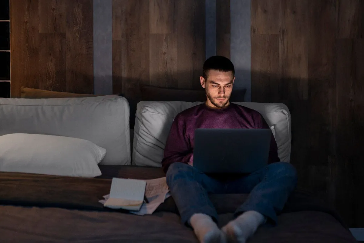 full shot man working late night 23 2150280999