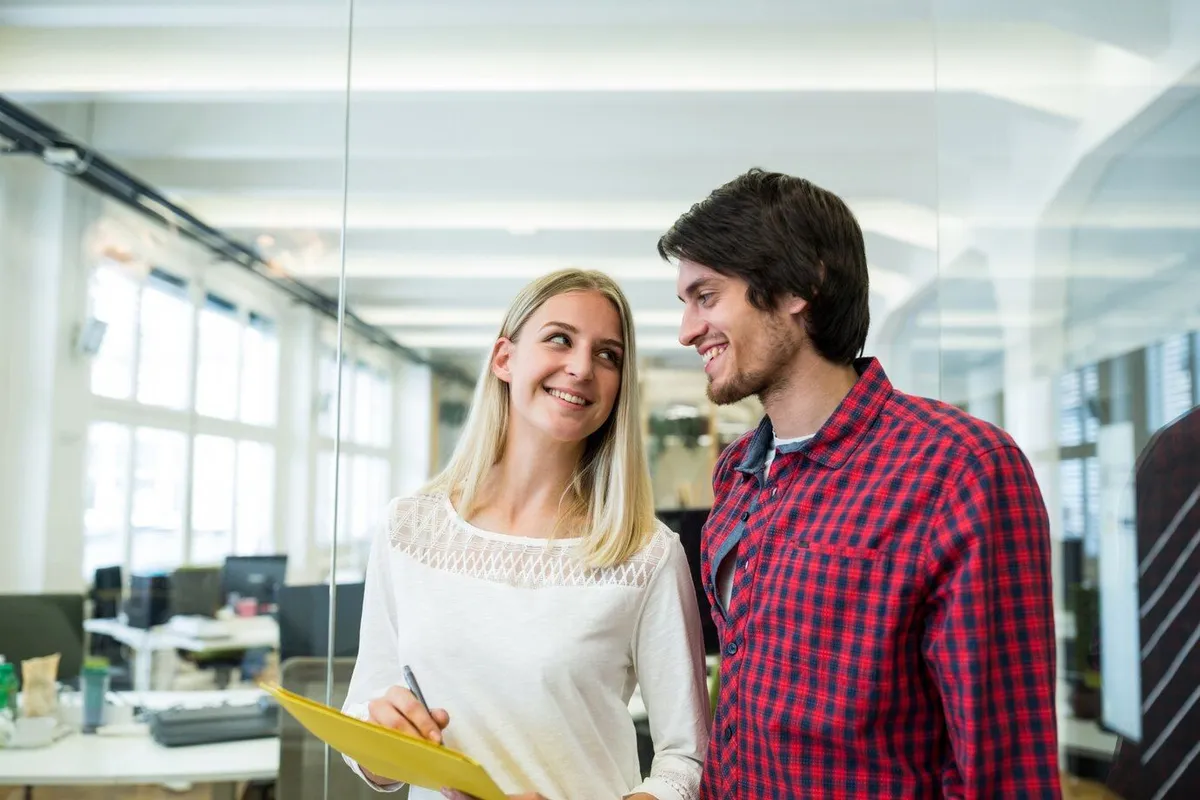 male female business executive interacting document 1170 874