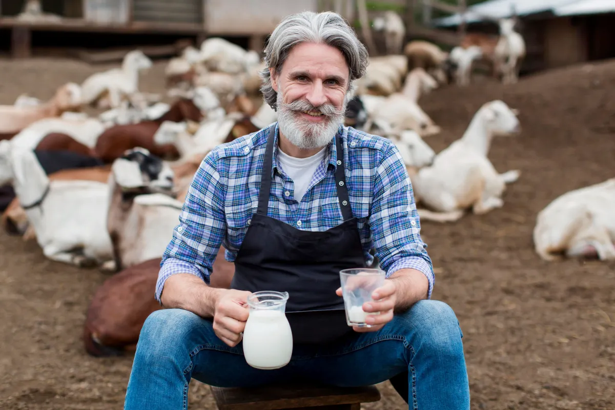 man drinking goat milk
