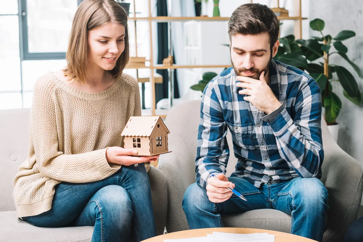 young couple thinking mortgage