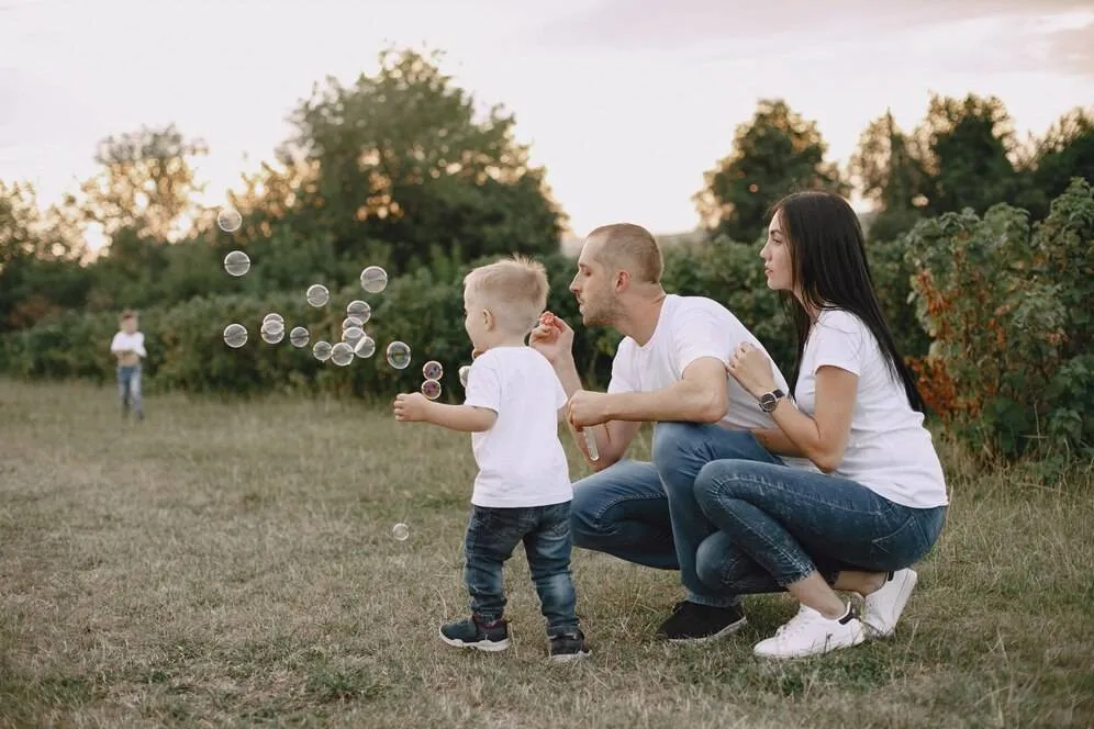 cute family playing summer field 1157 38976