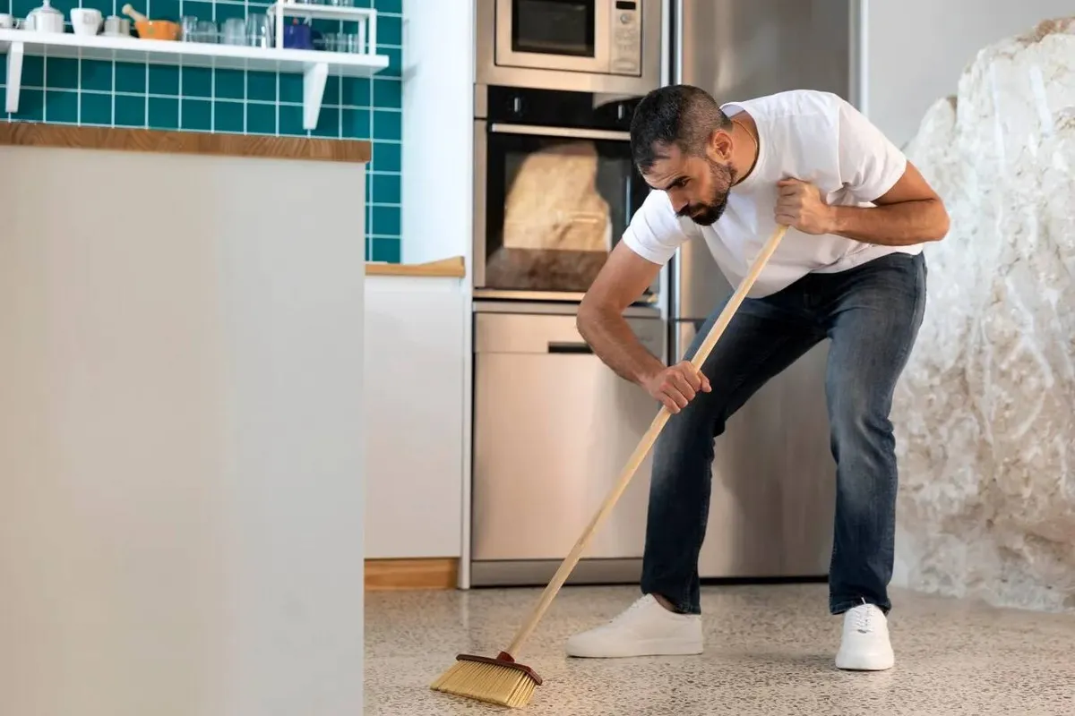 full shot man cleaning kitchen 23 2148931342jpg